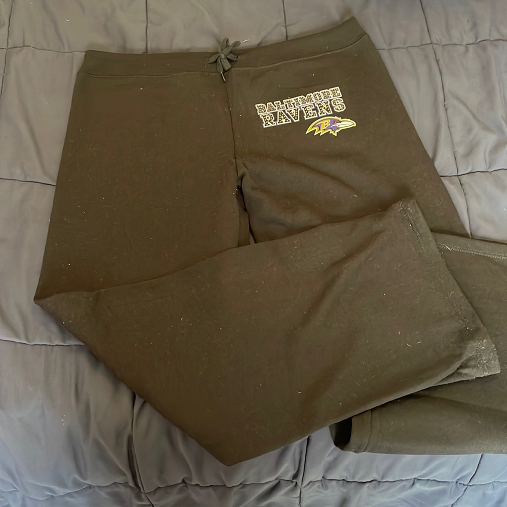 Never worn NFL Baltimore ravens sweats. Fleece inside.